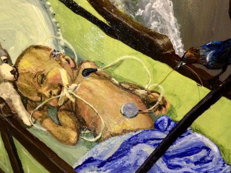 a detail of a painting showing an infant connected to wires and monitors. Some of the wires are made of actual electrical wire stitched into the canvas. A brown headed cowbird is depicted puling on one of the wires connected to the infant's arms.